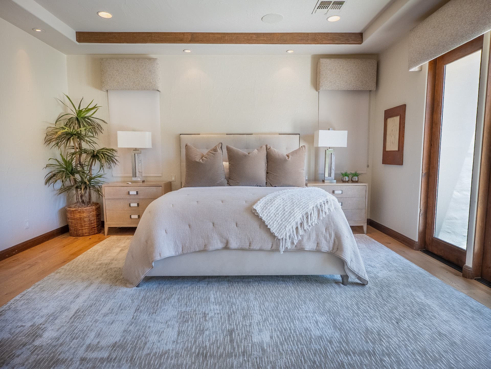 Primary bedroom suite with patio access